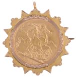 A George V 1913 gold full sovereign coin, in 9ct two-colour gold brooch mount, 30.4mm, 10.9g gross