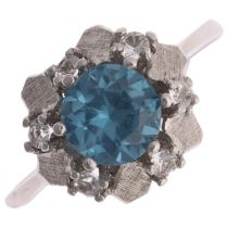 An 18ct white gold blue and white topaz flowerhead dress ring, setting height 10.7mm, size Q, 2.9g