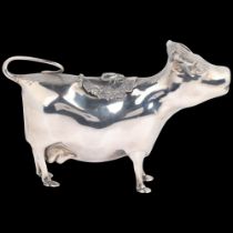 An Elizabeth II silver figural cow creamer jug, Searle & Co Ltd, London 1961, 15cm, 5oz No damage or