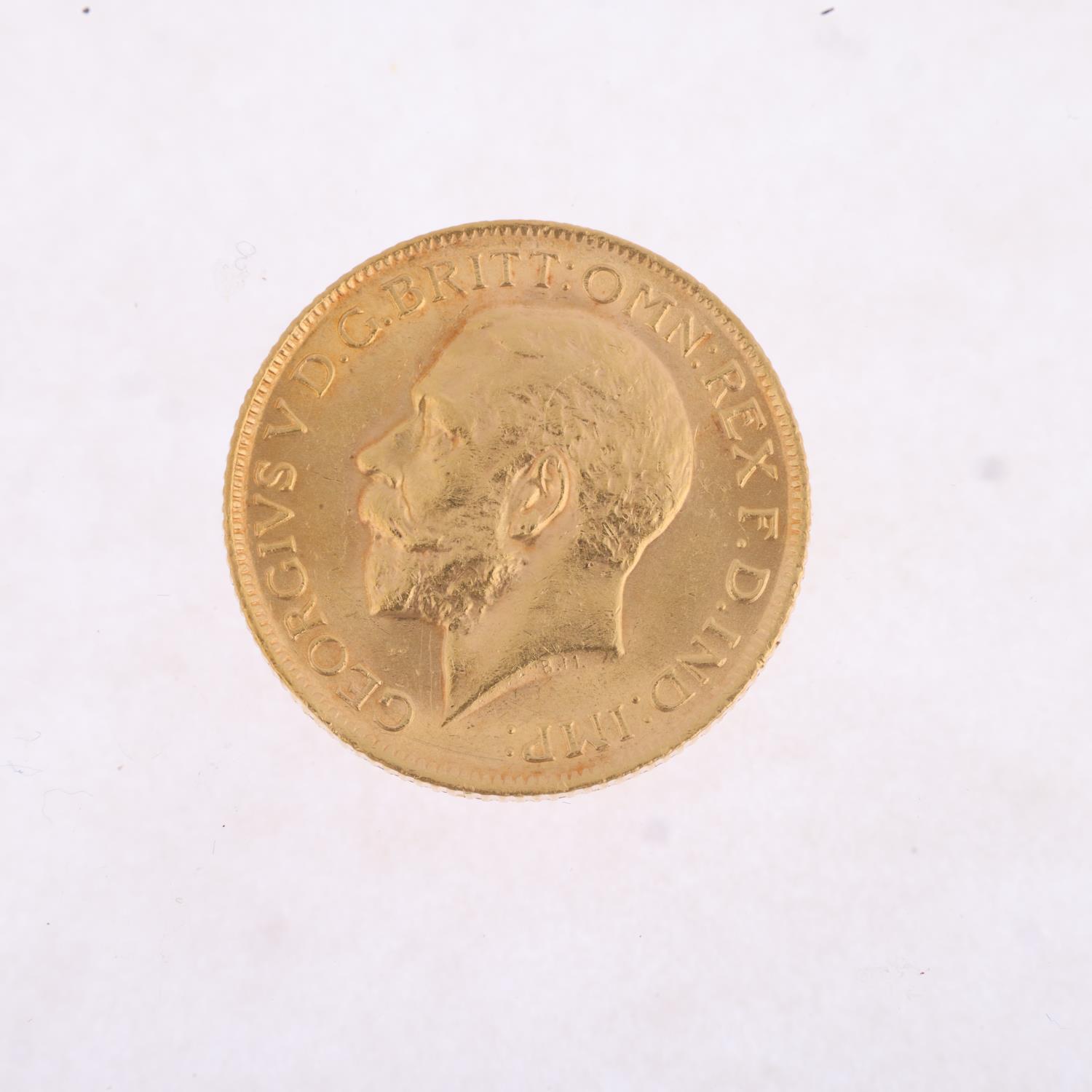 A George V 1913 gold full sovereign coin, 7.9g Light wear to high points - Image 2 of 4