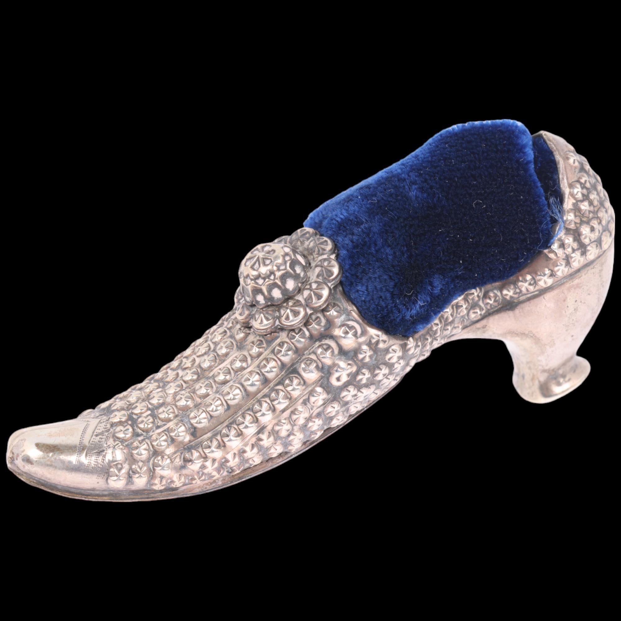 A late Victorian novelty silver lady's shoe pin cushion, Adie & Lovekin Ltd, Birmingham 1895, 6.