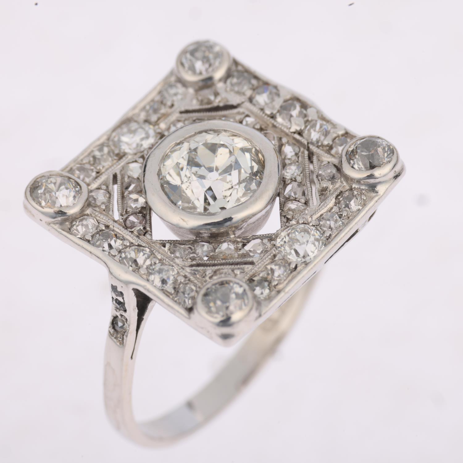 An Art Deco platinum diamond geometric panel ring, centrally set with 1.15ct old European-cut - Image 2 of 4