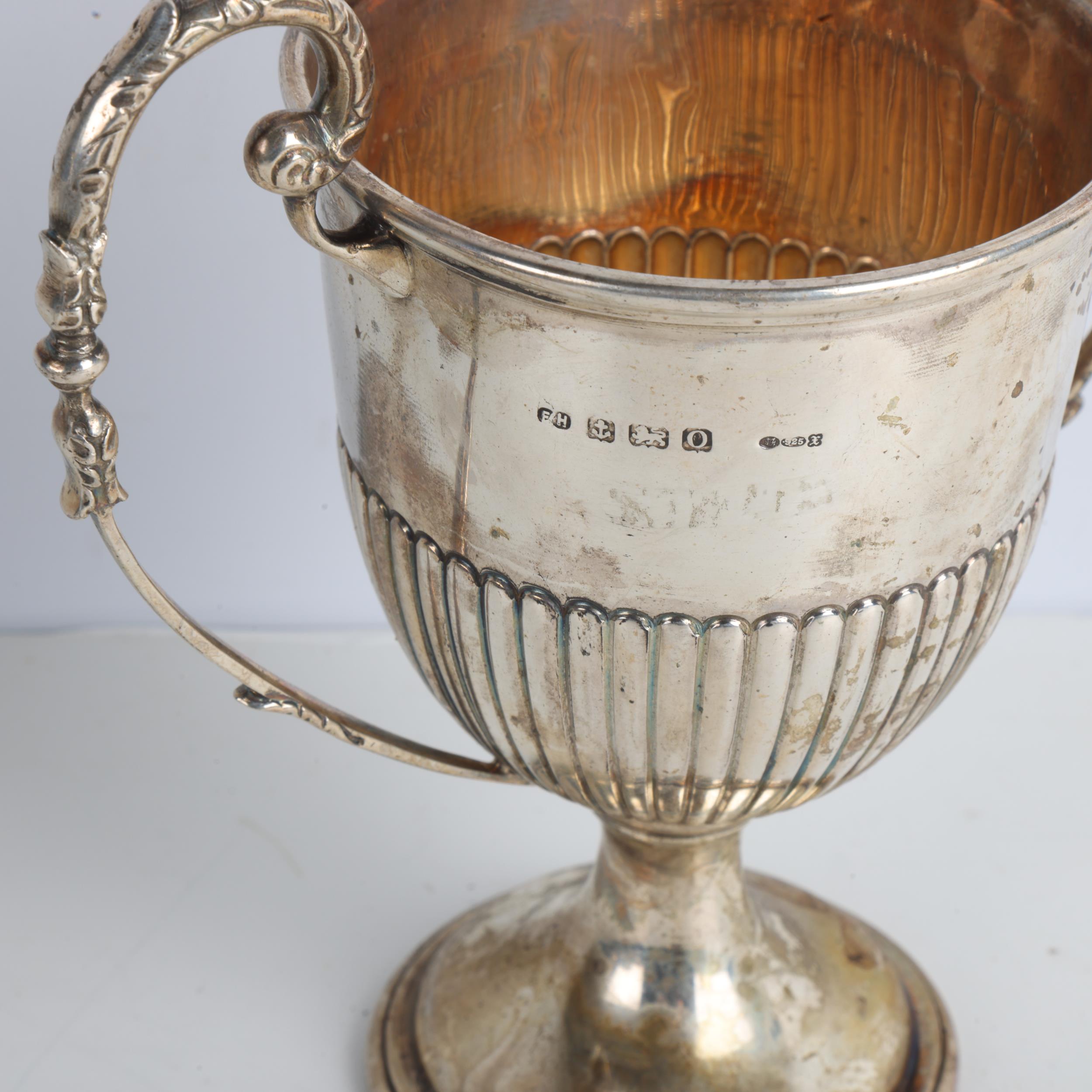 A George VI silver 2-handled trophy cup, Birmingham 1938, 14cm, 7.5oz Body and handles have - Image 3 of 3