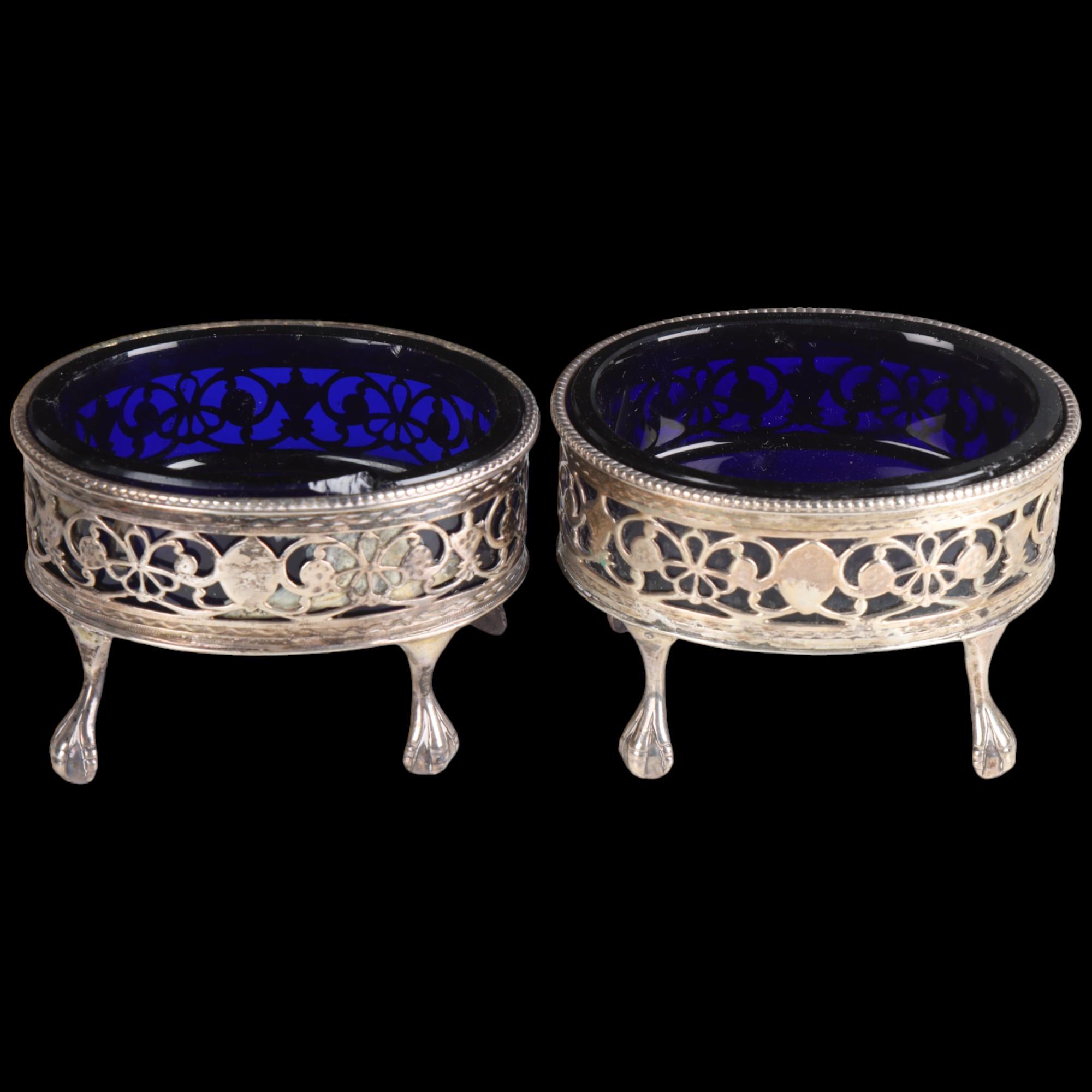 A pair of George III silver table salt cellars, possibly Thomas Dicks, London 1817, oval form with