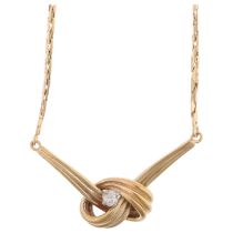 A 9ct gold 0.15ct solitaire diamond knot pendant necklace, 40cm, 8.1g No damage or repair, no broken