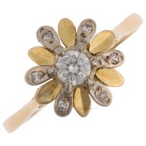 An 18ct gold diamond flowerhead cluster ring, indistinct hallmarks, set with modern round