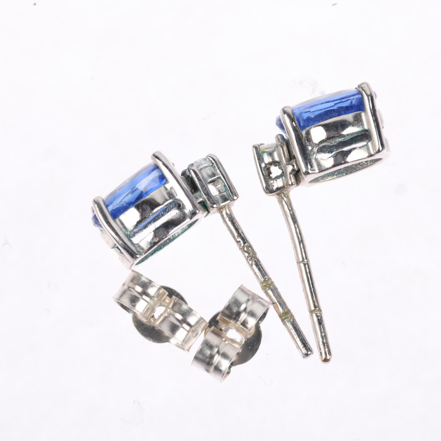 A pair of 9ct white gold sapphire and diamond earrings, set with oval mixed-cut sapphires, rose- - Image 3 of 4