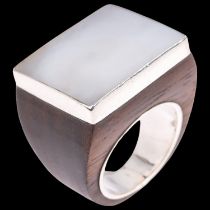 A large Danish sterling silver mother-of-pearl and hardwood signet ring, setting height 22mm, size