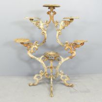 An antique ornate continental painted metal plant stand. 92x103x46cm. One plant stand broken.