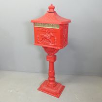 A painted Victorian style letterbox. 43x118x30cm. As new condition. With keys.