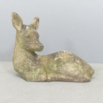 A weathered concrete garden statue, study of a deer. 48x37x23cm.