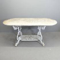 A weathered oval marble topped garden table on painted cast metal base. 178z74.5x89cm. Marble top is