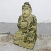 A weathered stone statue, study of Buddha holding an incense burner. 30x60x28cm.