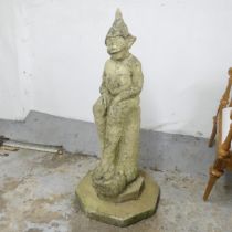 A large garden statue, study of a pixie on log, on octagonal plinth base. Overall height 112cm.