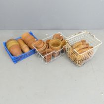 A quantity of approximately 140 terracotta pots. Largest 15cm, smallest 5cm.