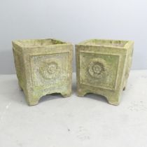 A pair of weathered concrete square garden planters with Tudor rose design. 34x36cm.