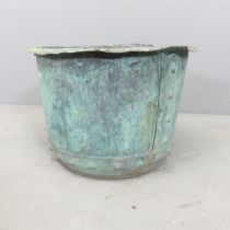 An antique verdigris copper copper, of riveted construction. 46x32cm. Two splits around top.