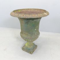 An antique French cast iron Campana urn, with Parisian stamp to base. 46x60cm.