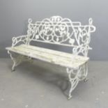 A Victorian painted wrought iron garden bench, with slatted wooden seat. Overall 123x86x55cm, seat