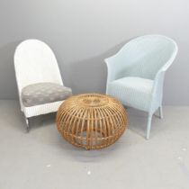 A Lloyd Loom nursing chair, a Lloyd loom armchair and a low wicker occasional table (3). Maker's