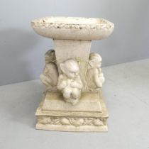 LEFCO A Victorian glazed ceramic bird bath, the central column surrounded by imps, with pedestal