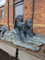 A pair of large and impressive patinated Bronze Sphinx statues, with snake crown and hieroglyph