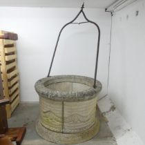 A weathered concrete 6-section garden well, diameter 103cm, overall height 203cm, well height 73cm