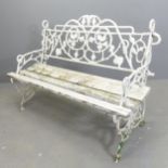 A Victorian painted wrought iron garden bench, with slatted wooden seat. Overall 122x85x55cm, seat