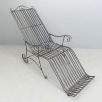 A painted iron folding sun lounger. Overall 160x105x72cm. Some chips and loss to paint, otherwise