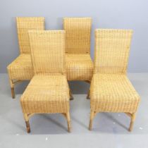 A set of four bamboo and wicker conservatory chairs.