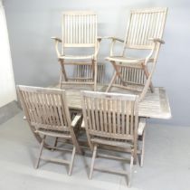 A weathered teak folding garden table, 160x74x100cm, and six matching folding chairs. All labelled