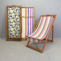 JOHN LEWIS - a pair of teak framed folding deck chairs, and another similar deck chair. (3)