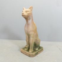 A terracotta garden statue, study of a seated cat. Height 52cm.