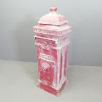 A cast aluminium postbox. 36x100x32cm. There is a slot for posting letters through. Side door is