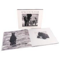 David Yarrow, large coffee table book with photographs of animals and figures titled Encounter