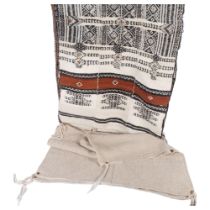 A Ethnic blanket, cream ground with black symmetrical Ethnic decoration, approx 260cm x 130cm,