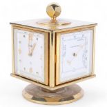 Neiman-Marcus, a mid-century gilt desk clock and weather compendium, on revolving stand, Swiss-