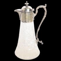 A 20th century moulded glass Claret jug, with engraved silver plated mounts, H28cm