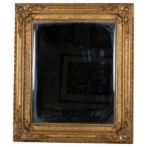 An Antique giltwood and gesso rectangular bevel-edge wall mirror, 61cm x 71cm overall
