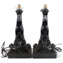 A pair of painted plaster French Art Deco style table lamps, in the form of 2 sculptural female