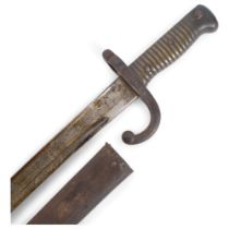 A French 1866 pattern Chassepot bayonet and scabbard, with script along the top edge, blade length