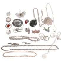 A group of various silver jewellery, including a butterfly filigree brooch, a Victorian mourning