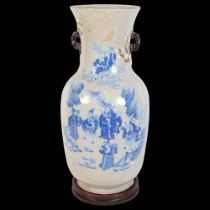 A large Chinese crackle glaze baluster vase, blue and white figural decoration and blossom