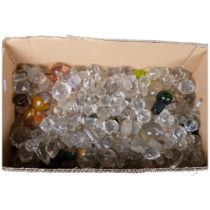 A box of glass decanter stoppers