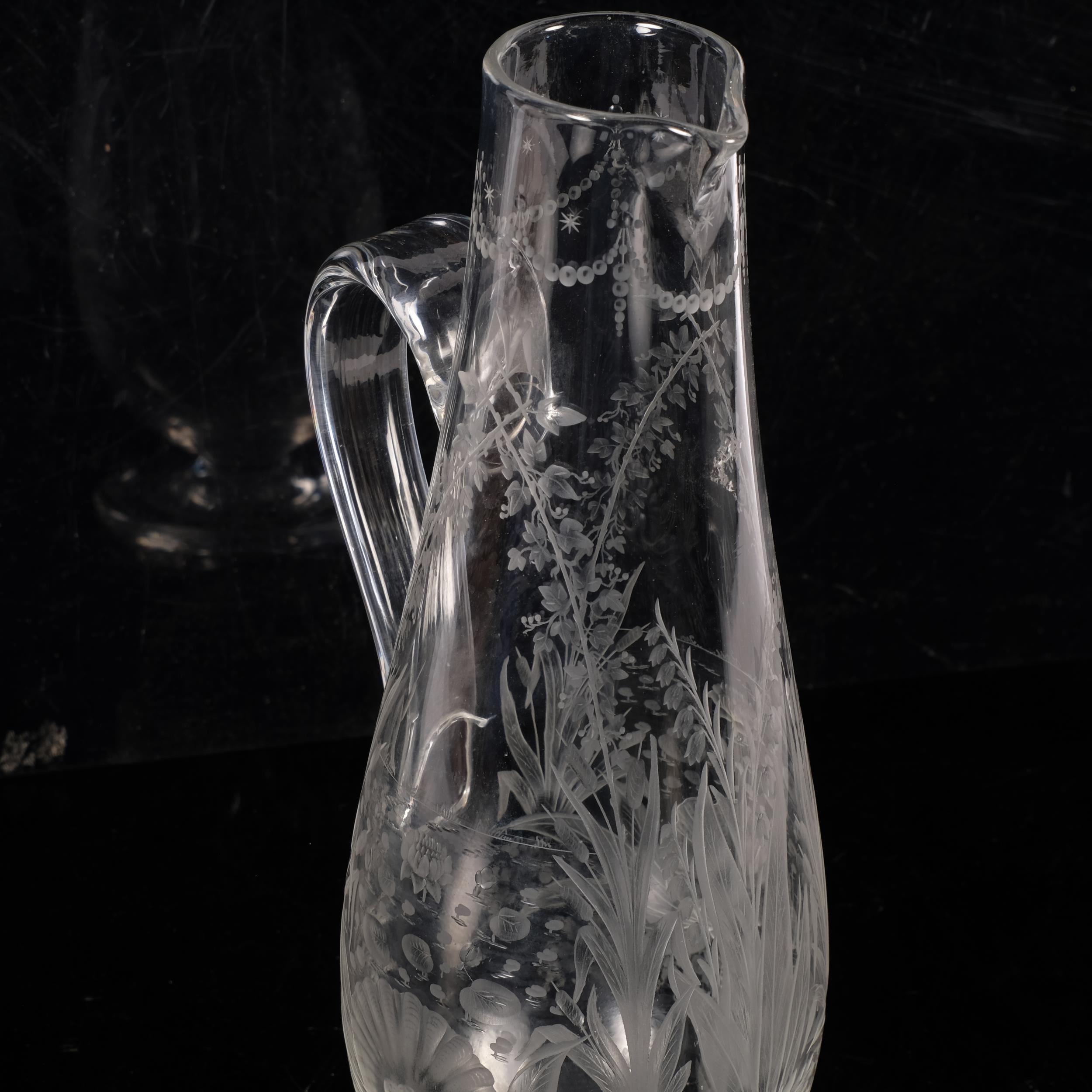 An Antique Stourbridge etched glass Claret jug, with floral decoration, on turned foot, H30.5cm - Image 2 of 2