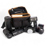 A Pentax LX 35mm SLR film camera, with an associated Pentax-M 1:1.4 50mm lens, associated flash