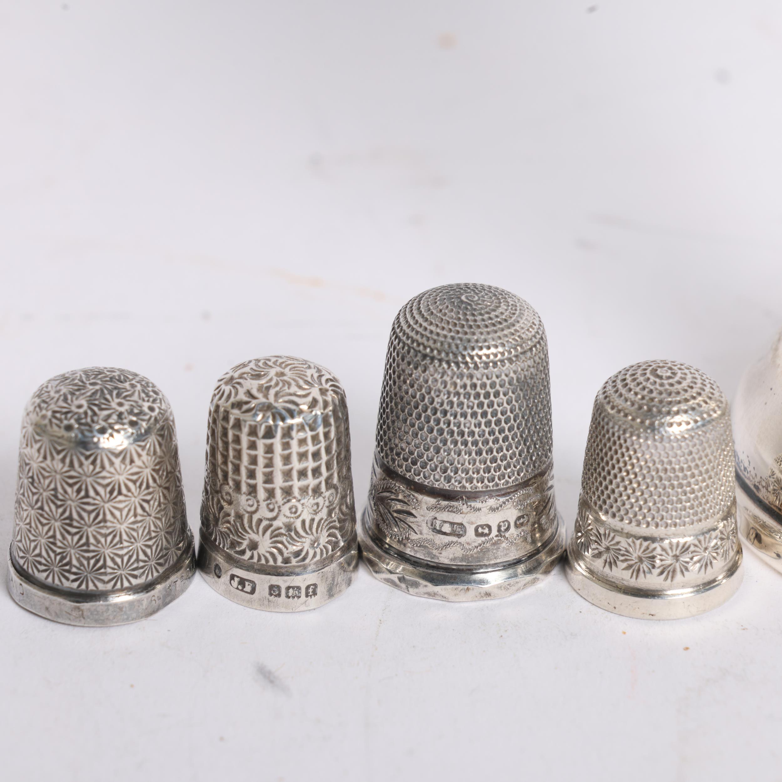 4 engraved silver thimbles, and a small silver bud vase with weighted base, vase height 11cm - Image 2 of 2