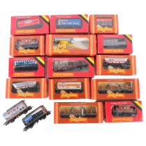 A quantity of Hornby Railways OO gauge goods wagons and other carriers, both boxed and unboxed, 16