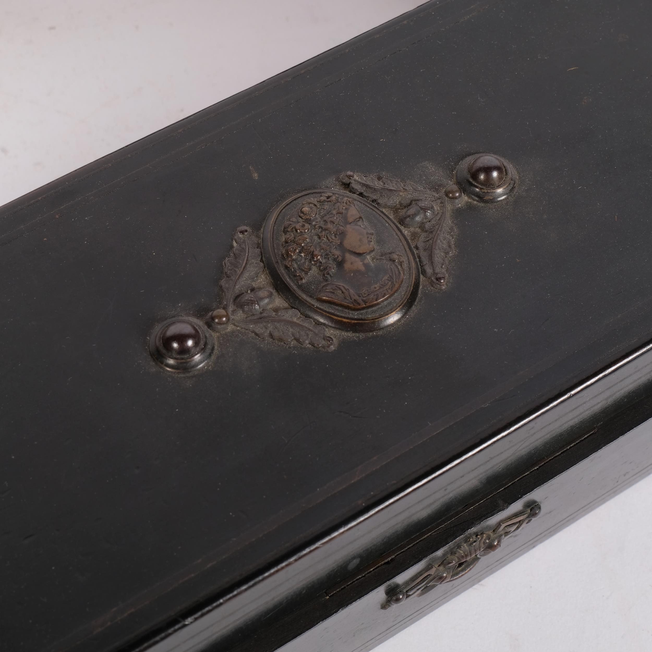 Antique ebonised box with embossed cartouche to the lid, 27.5cm, a carved wood cherub figure, and - Image 2 of 2