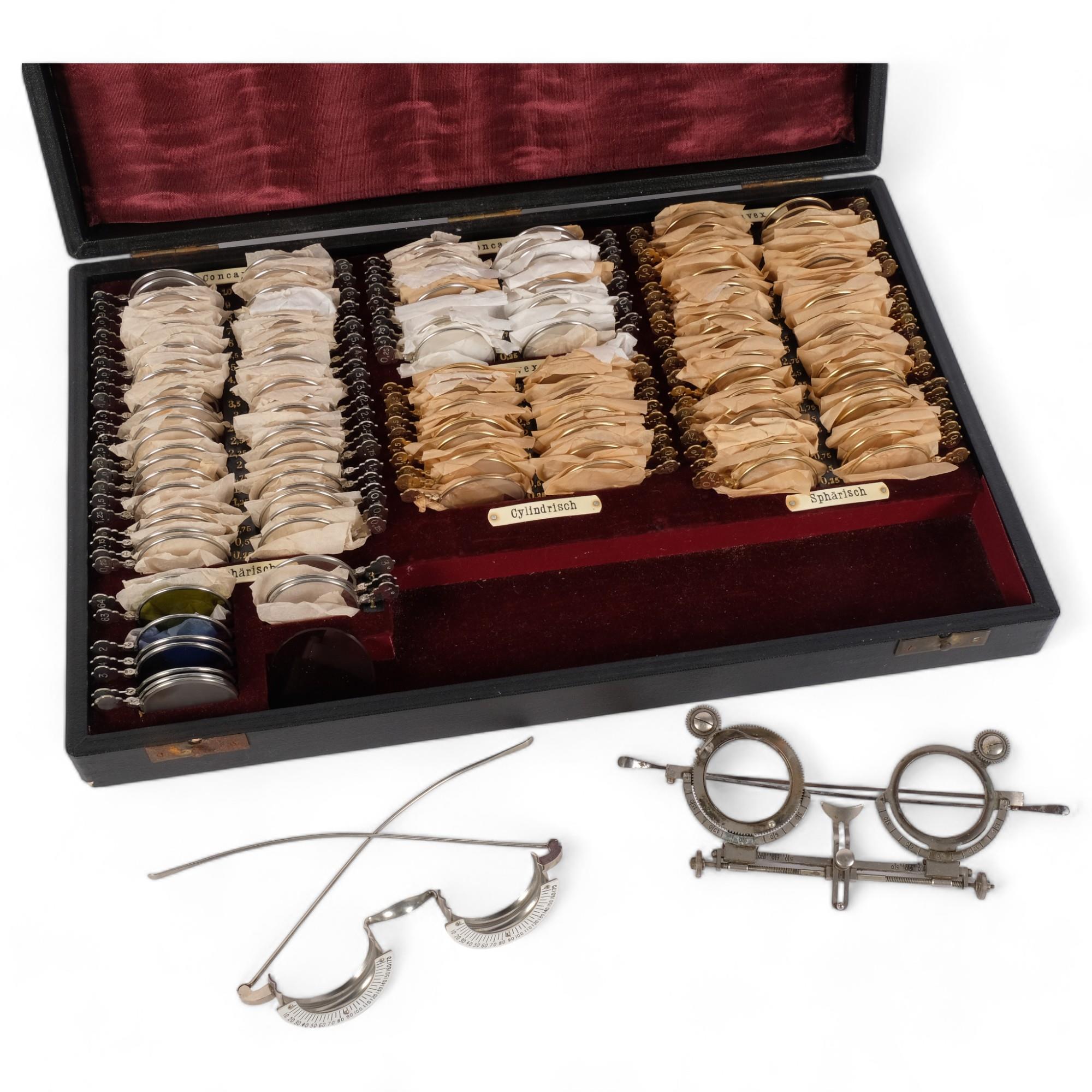 A Vintage cased set of optician's test lenses